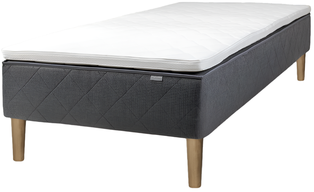 Hotel bed including top mattress.